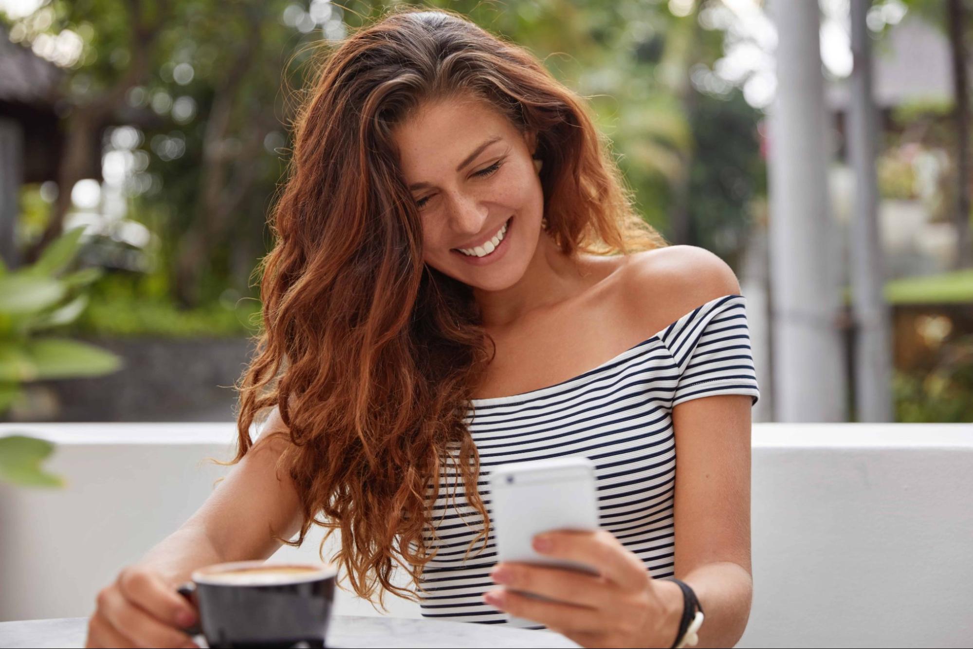 redhead woman using dating app for new relationship